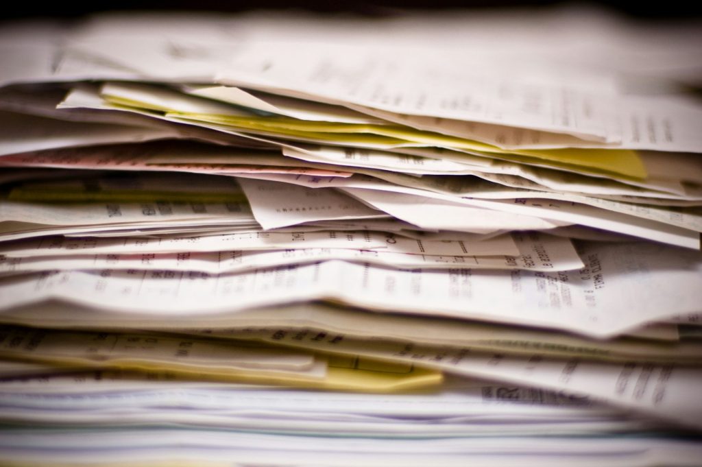 A close-up of a stack of papers.